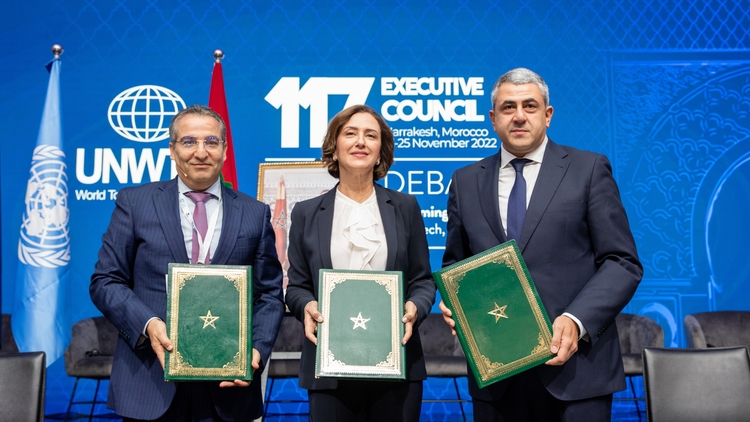 The Minister of Tourism of Morocco and the UNWTO Secretary-General pose, accompanied by the Director General of Smit, with the signed agreement / Photo: UNWTO