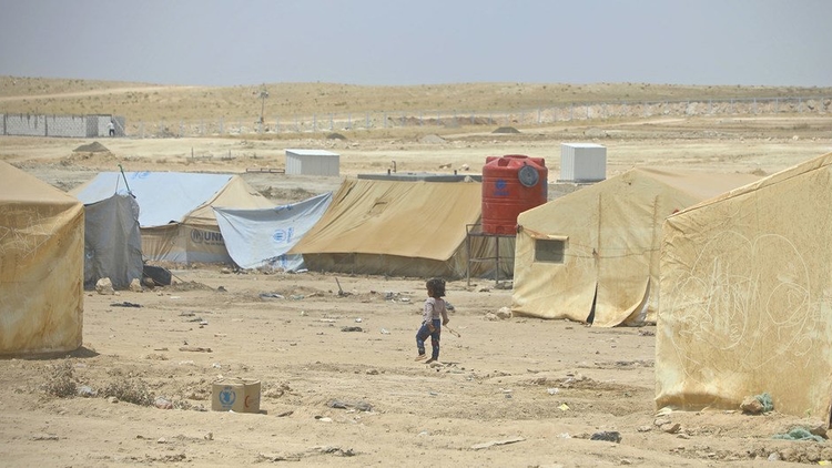 A child walks in the Al Hol camp in Syria / Photo: OCHA/Hedinn Halldorsson